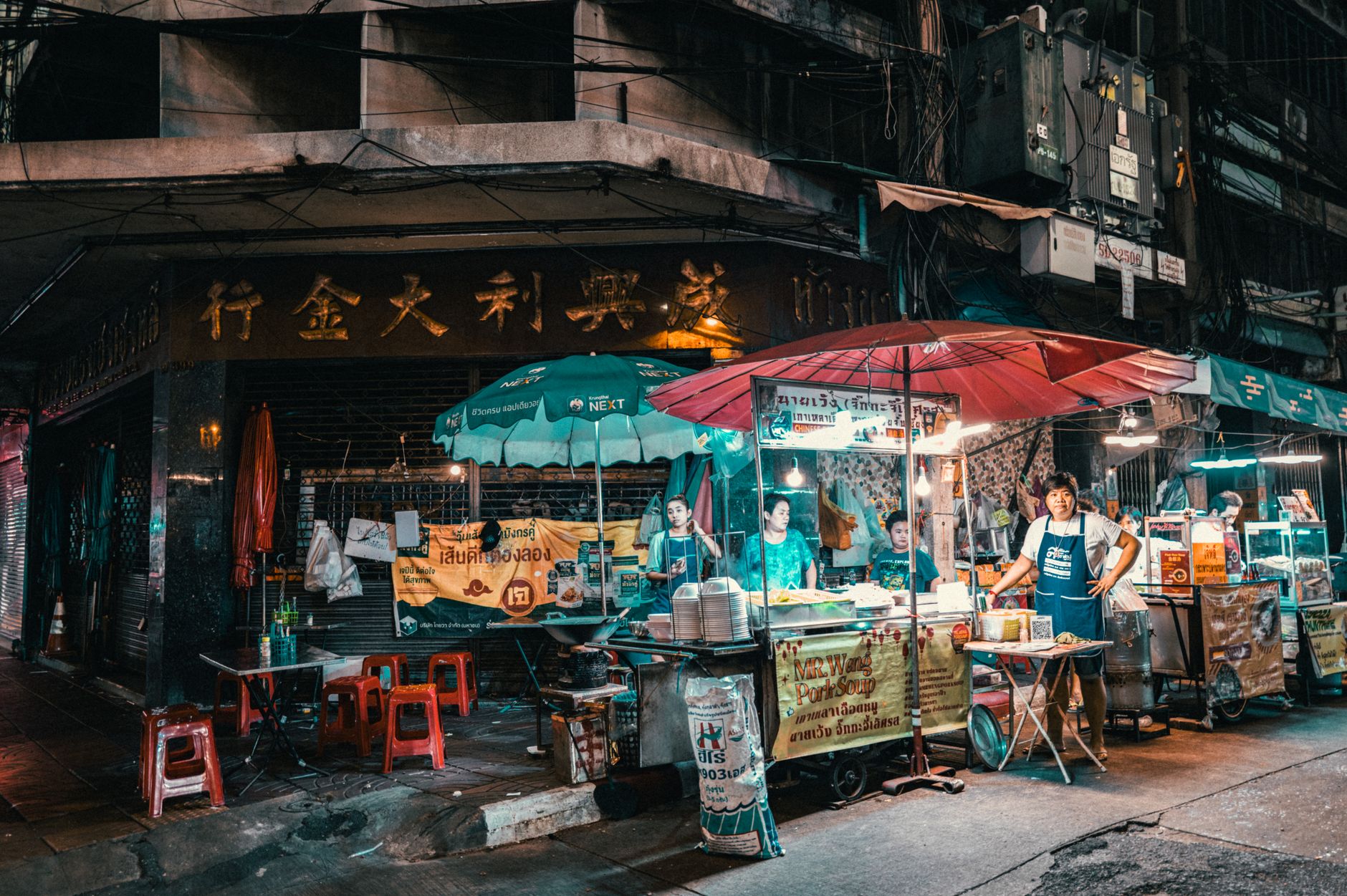 Crowded aisle of Chatuchak Weekend Market in Bangkok